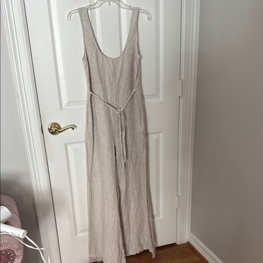 NWOT Reformation tan jumpsuit size small fits oversized